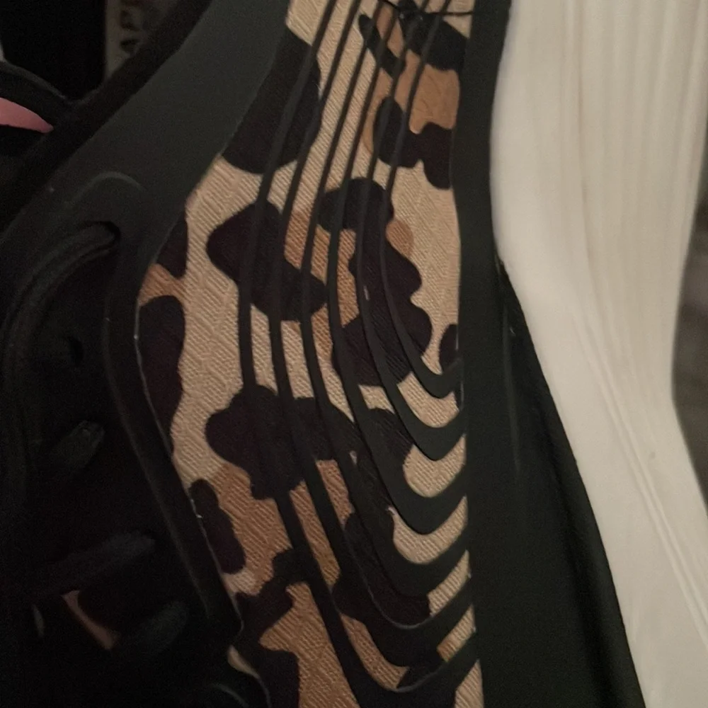 APL Leopard Print Athletic Sneakers in Black and Tan
